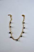 Collier 9 Perles de Tahiti en breloque sur chaîne dorée