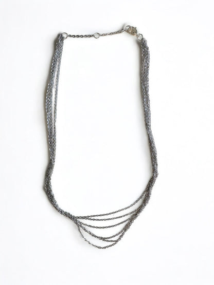 Collier rangs multiple acier argenté