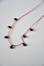 Collier Grenat sur soie