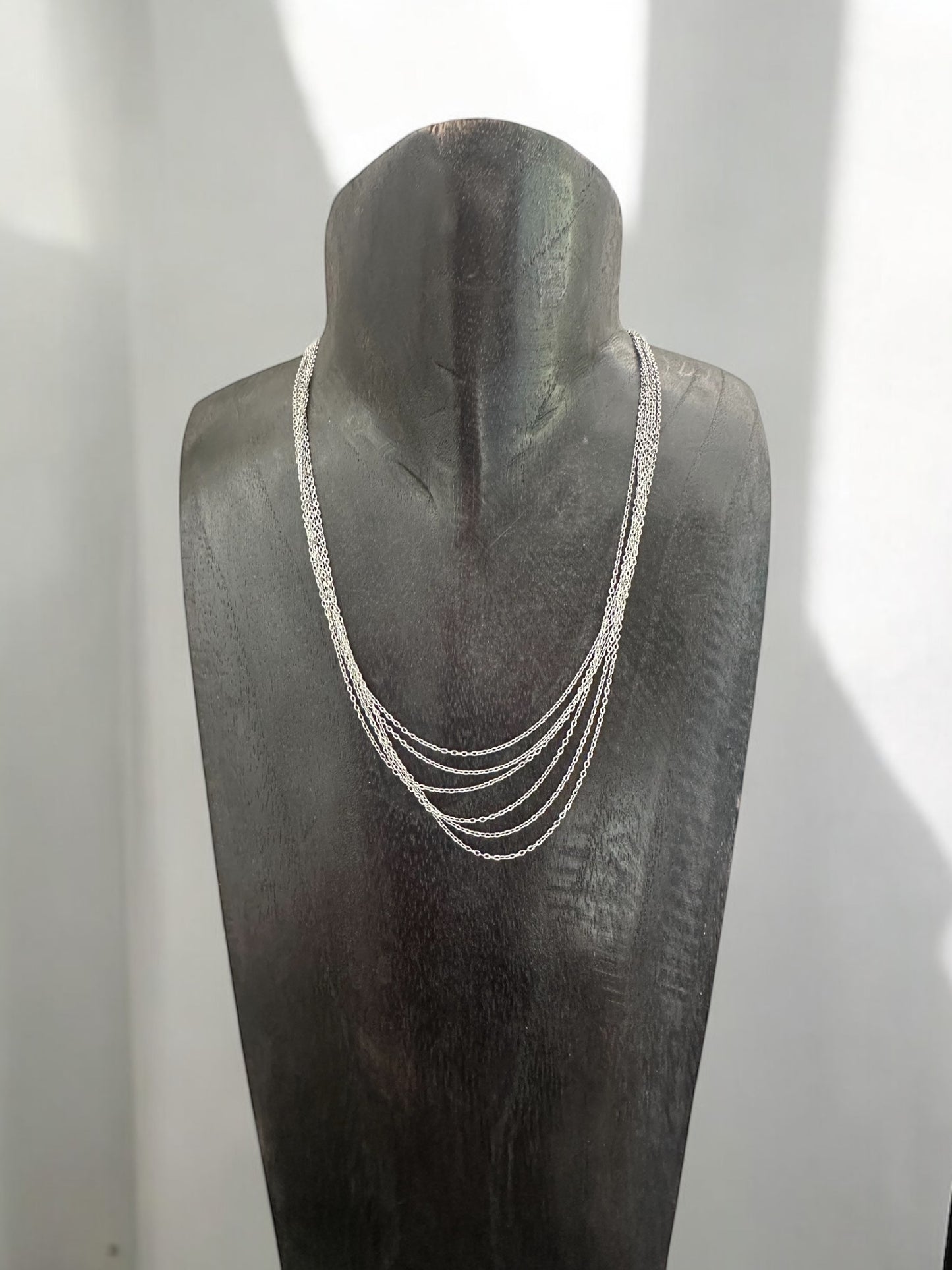 Collier rangs multiple acier argenté