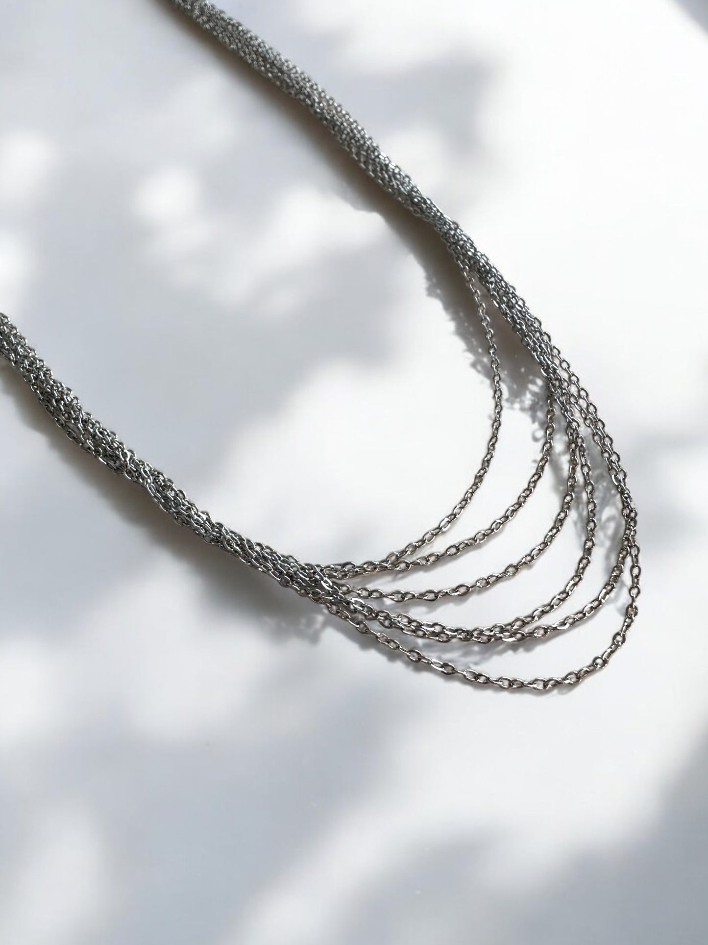 Collier rangs multiple acier argenté