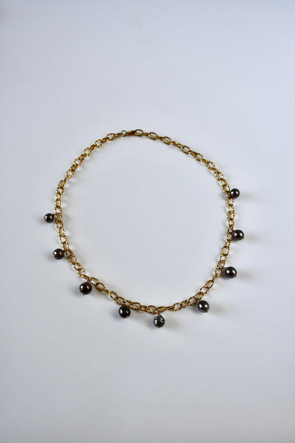 Collier 9 Perles de Tahiti en breloque sur chaîne dorée