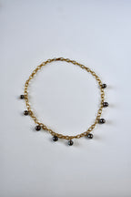 Collier 9 Perles de Tahiti en breloque sur chaîne dorée