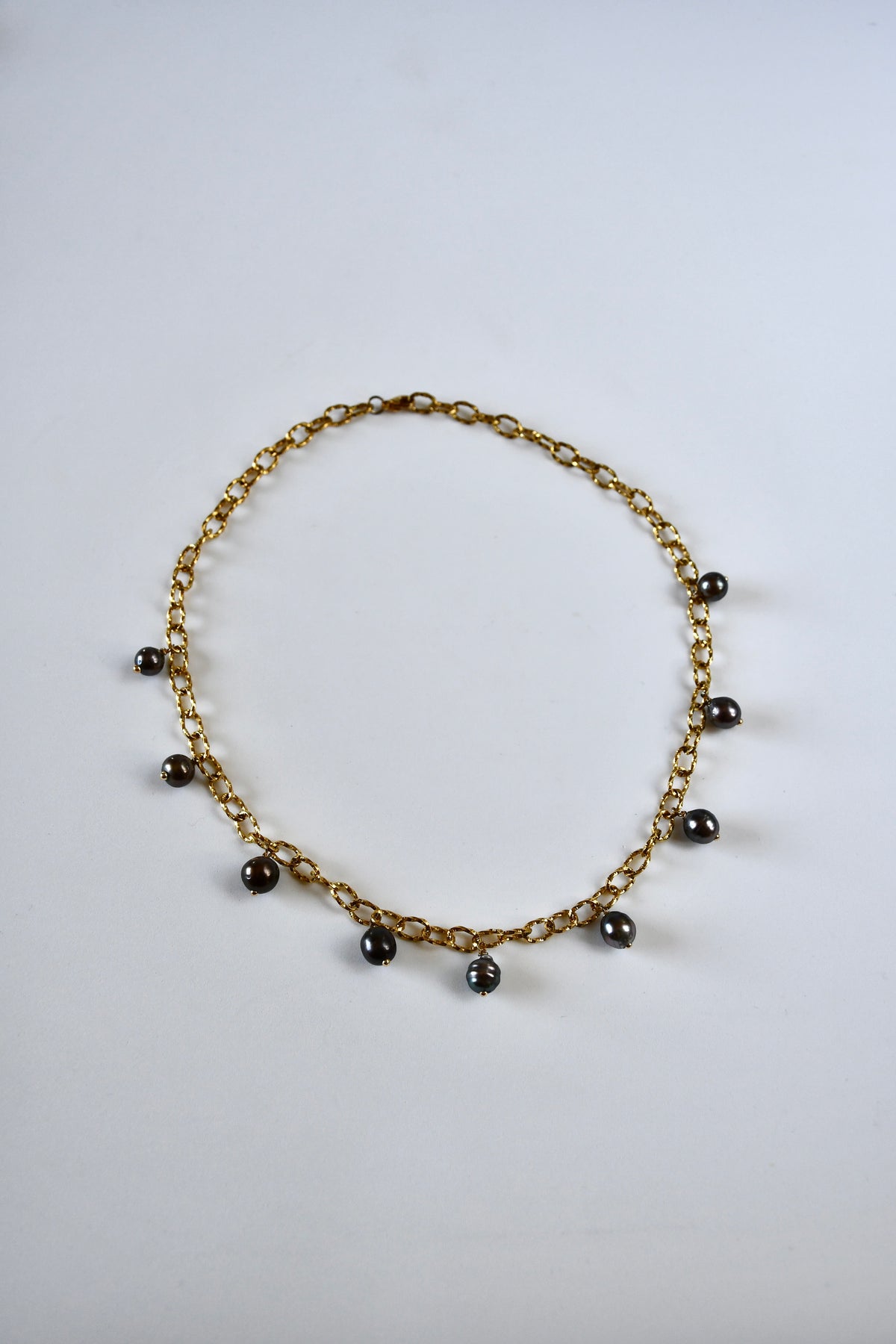 Collier 9 Perles de Tahiti en breloque sur chaîne dorée