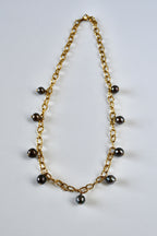 Collier 9 Perles de Tahiti en breloque sur chaîne dorée