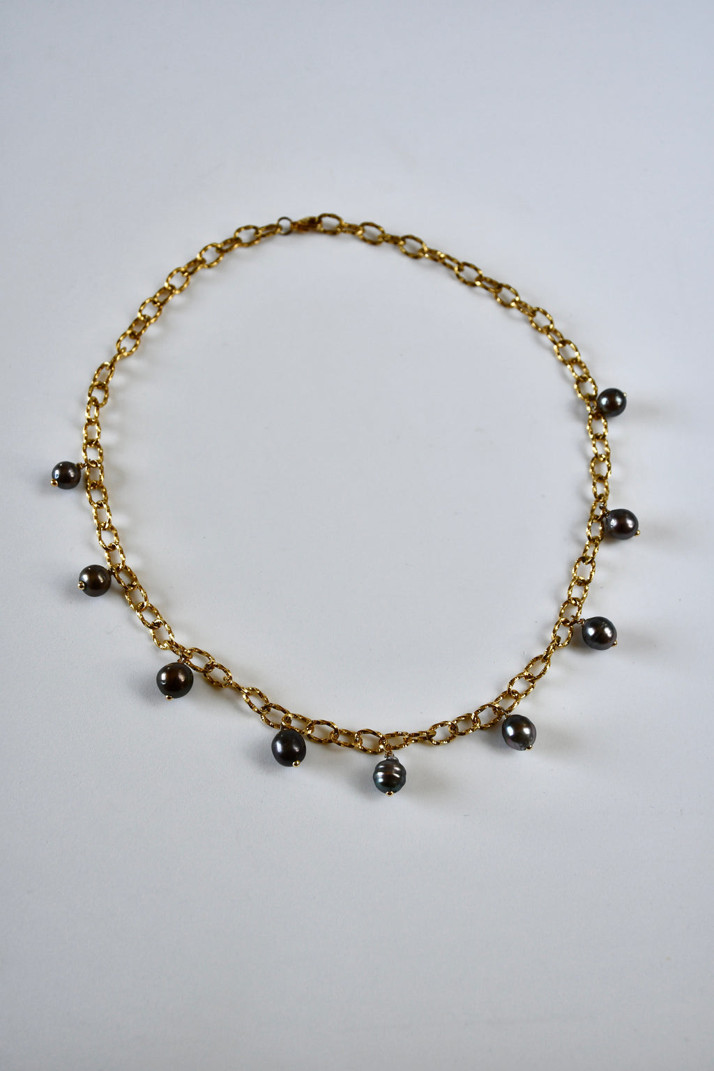 Collier 9 Perles de Tahiti en breloque sur chaîne dorée