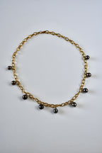 Collier 9 Perles de Tahiti en breloque sur chaîne dorée