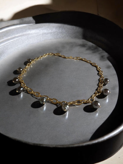 Collier de 9 Perles de Tahiti breloques