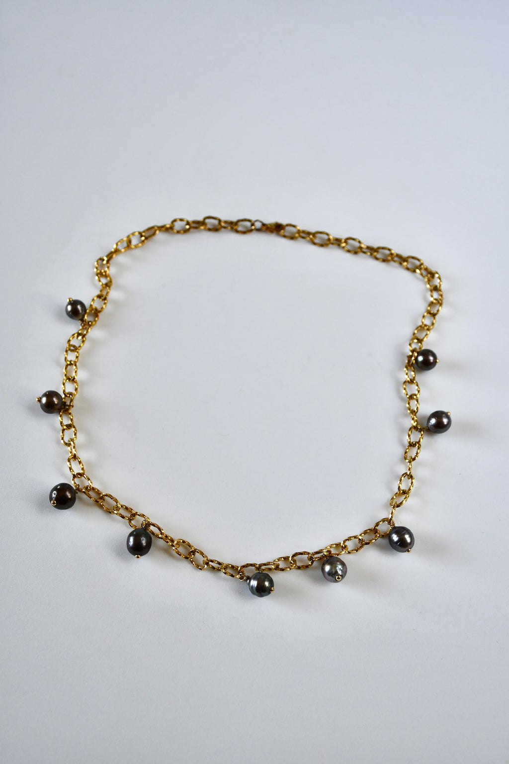 Collier 9 Perles de Tahiti en breloque sur chaîne dorée