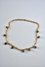 Collier 9 Perles de Tahiti en breloque sur chaîne dorée