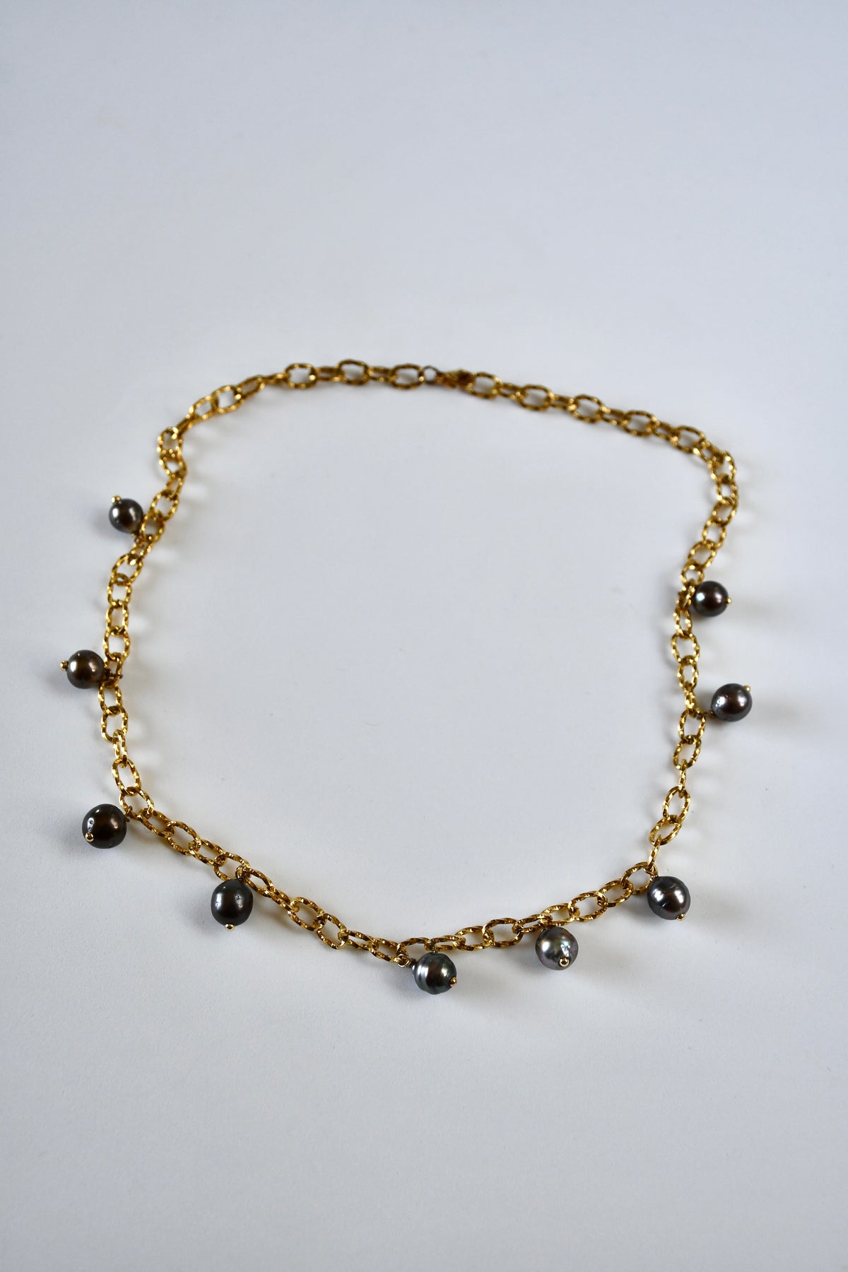 Collier 9 Perles de Tahiti en breloque sur chaîne dorée