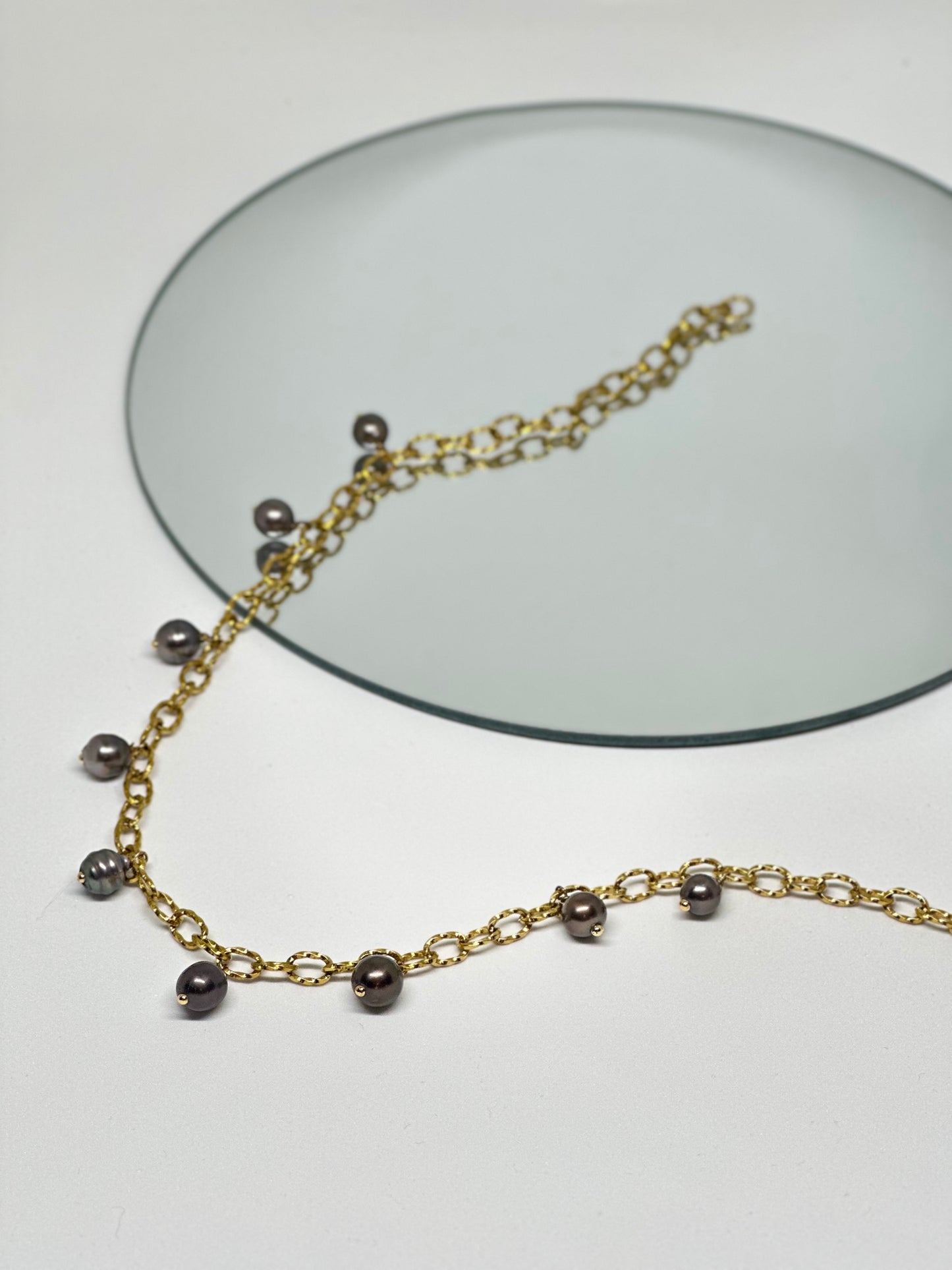 Collier de 9 Perles de Tahiti breloques