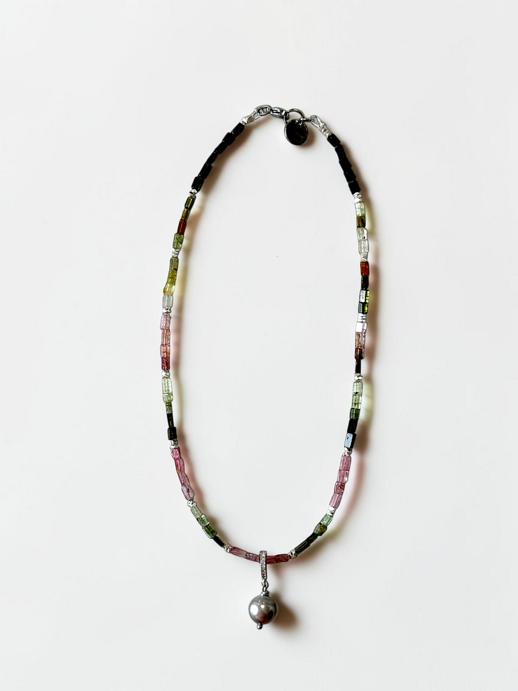 Collana di Tourmaline e Perla di Tahiti — Il mistero elettrico